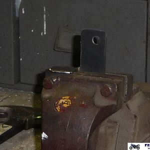 New exhaust clamp mount bracket.