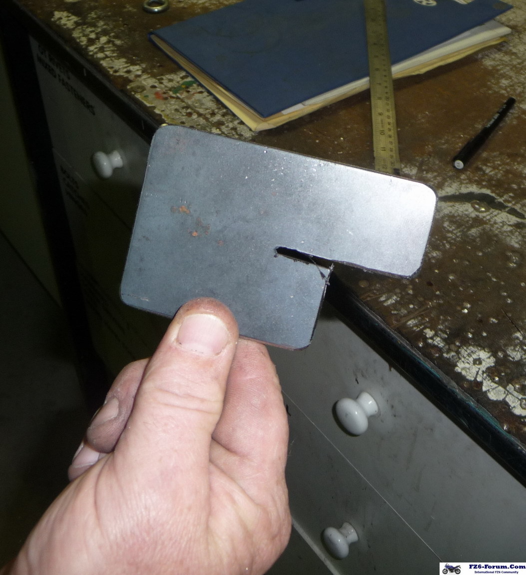 New exhaust clamp mount bracket.