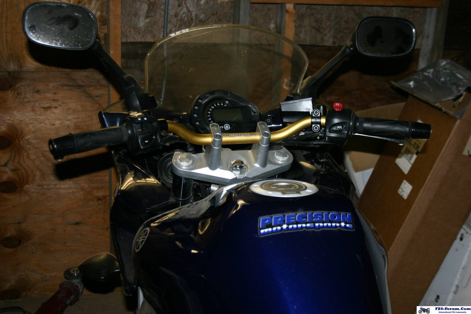 Renthal bars shortened 2 inches and tapped for Yamaha bar ends